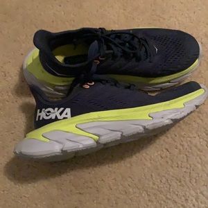 Hoka One One  running shoes. Worn a few times.